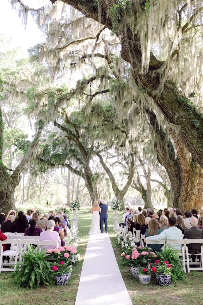 Small intimate wedding under live oak trees