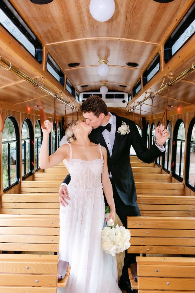 Married couple on their wedding day in a party bus
